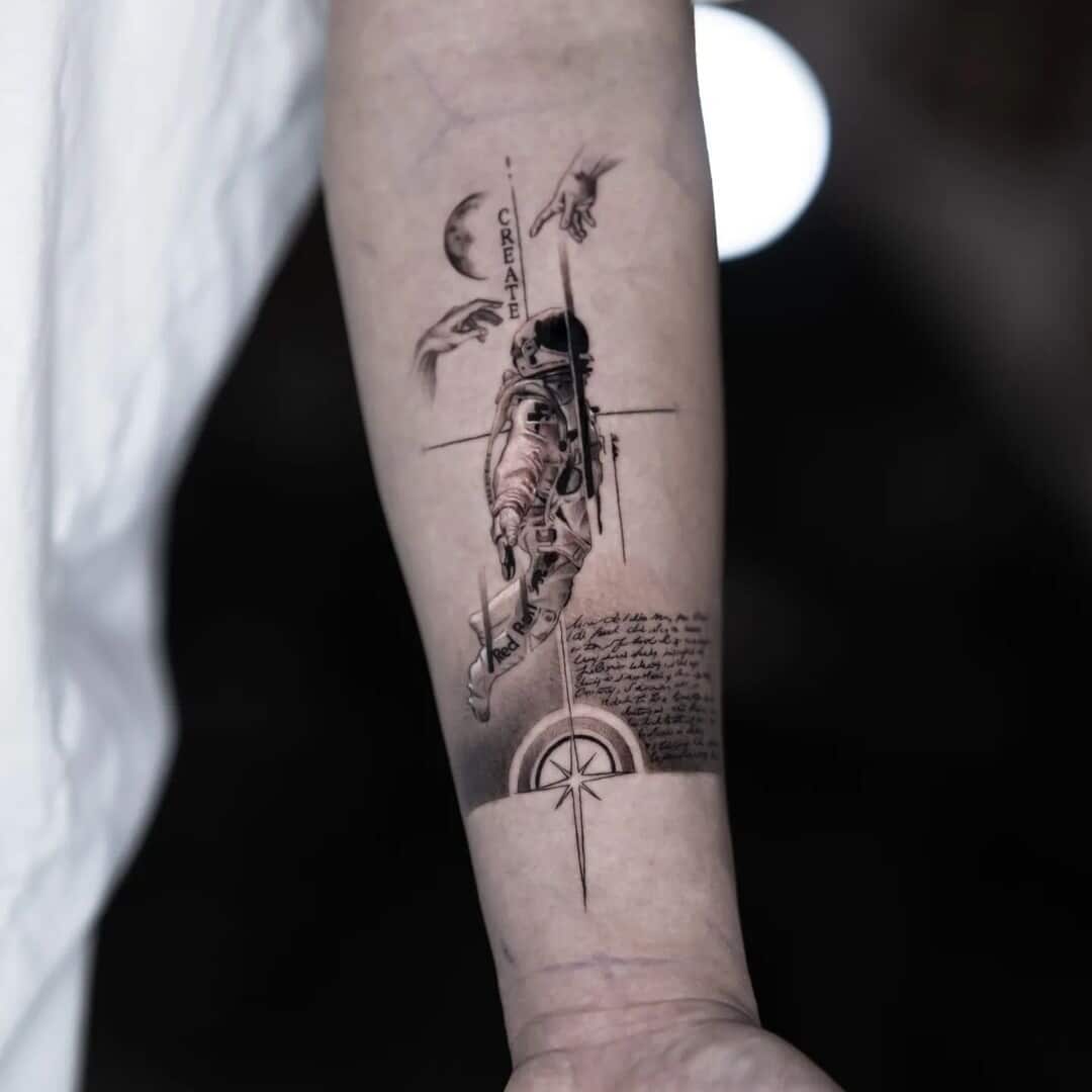 Astronaut tattoo art on forearm with celestial elements