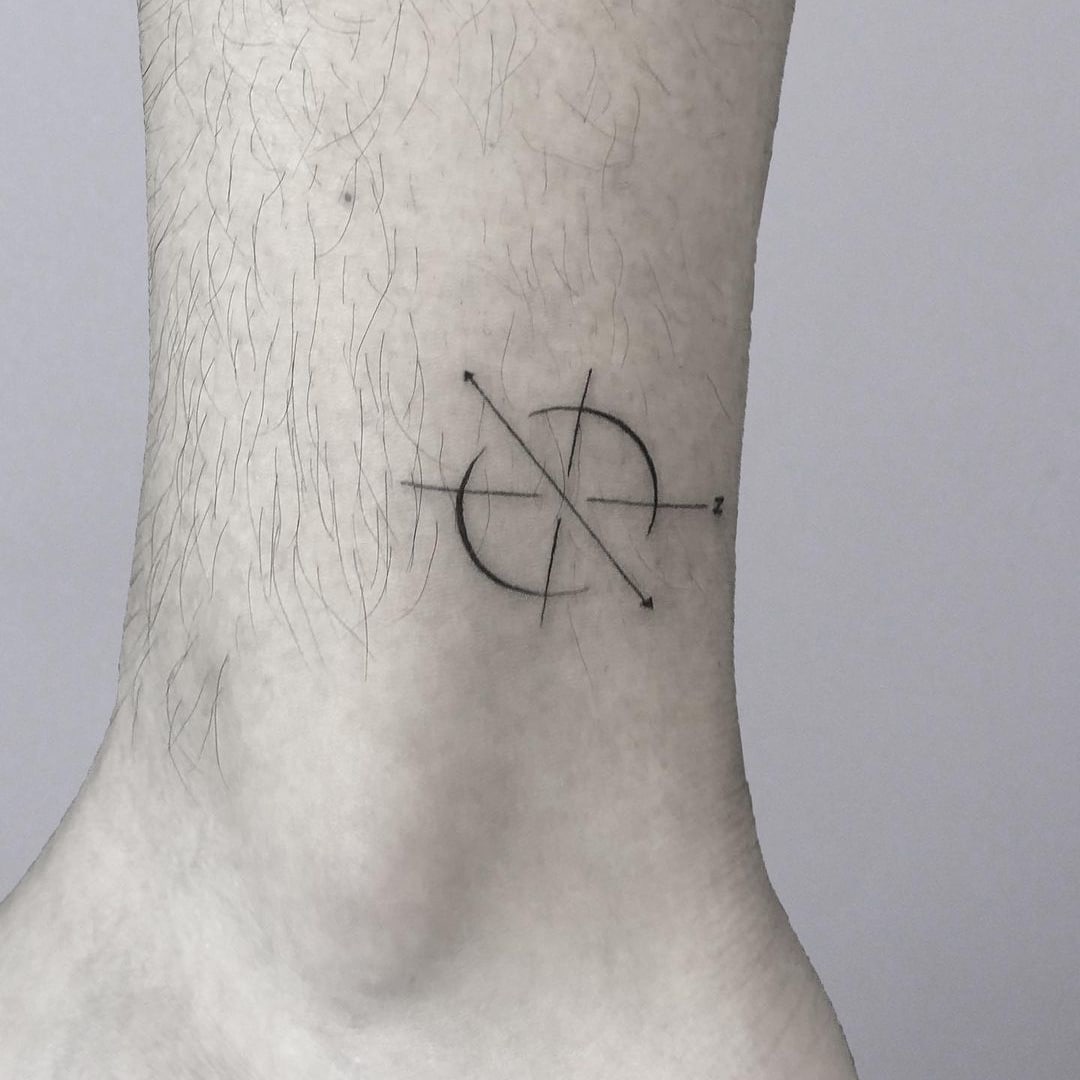 Close-up of a tattoo design on an ankle.