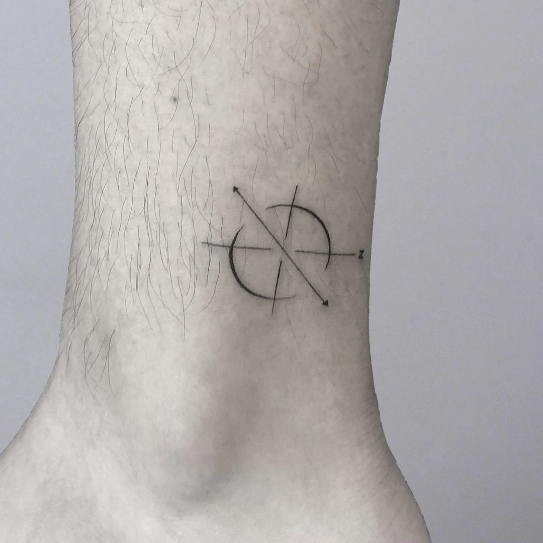 Close-up of a tattoo design on an ankle.