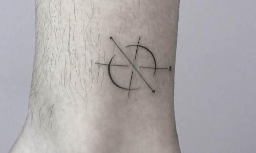 Minimalistic tattoo design featuring circular pattern and arrows.