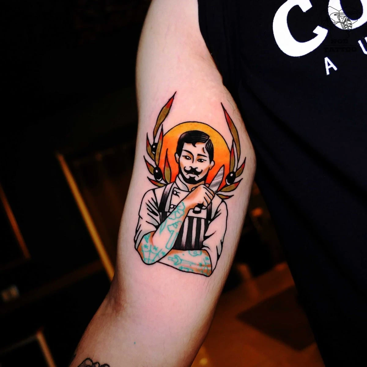 Tattoo of a barber with stylized design