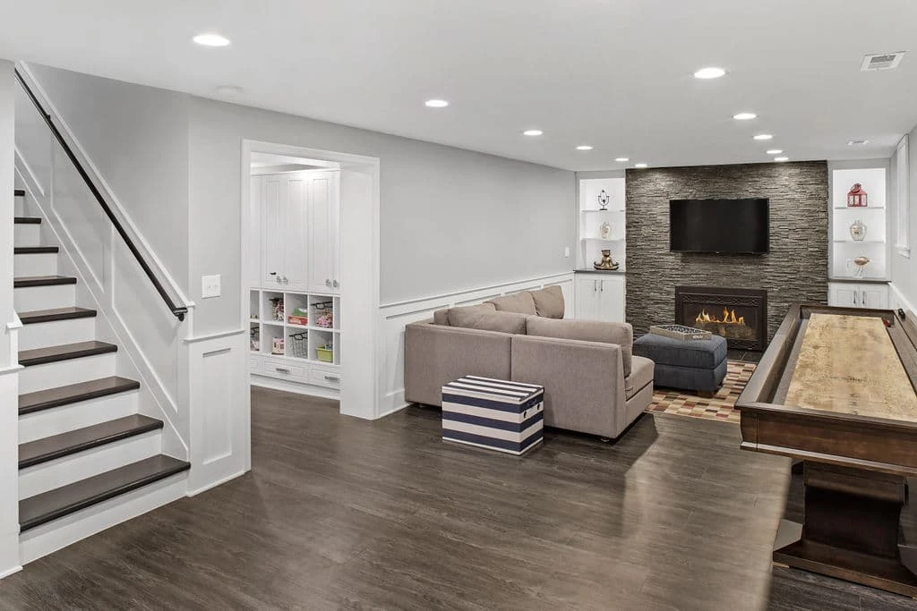 Modern living room with fireplace and stairs