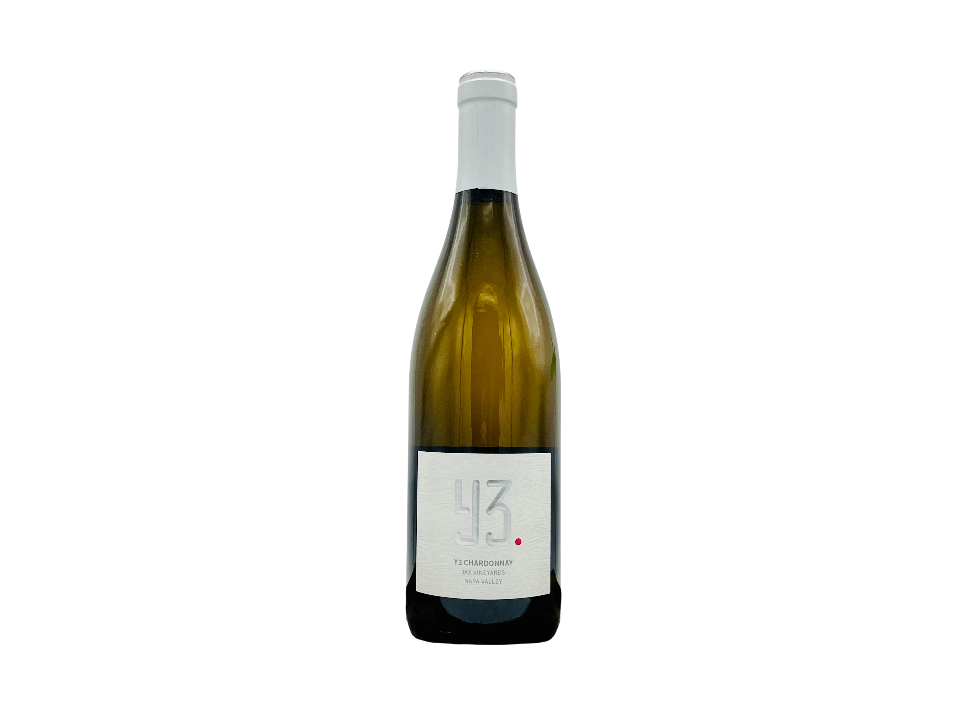 Bottle of Chardonnay wine on a black background