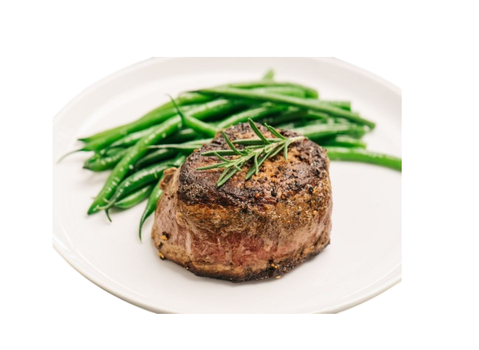 Delicious steak with green beans on a white plate