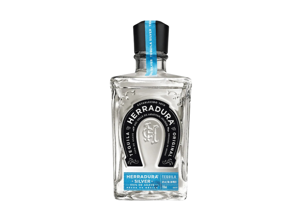 Bottle of Herradura Silver Tequila against a black background