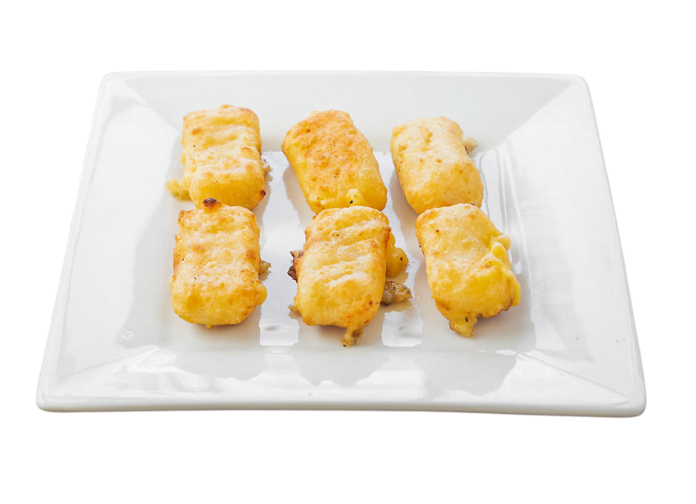 Golden fried cheese sticks on a white plate.