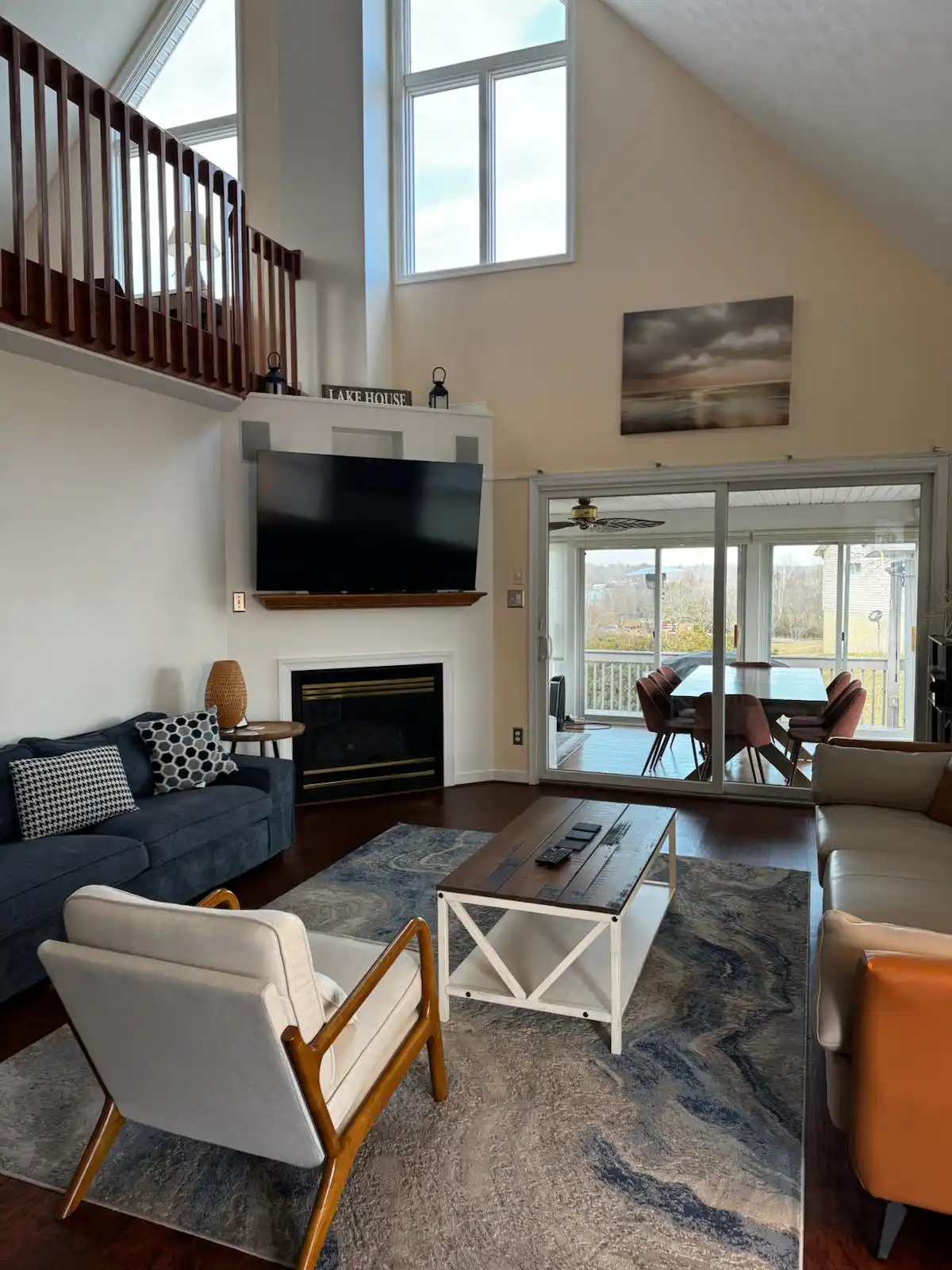 Modern living room with large windows and stylish furniture