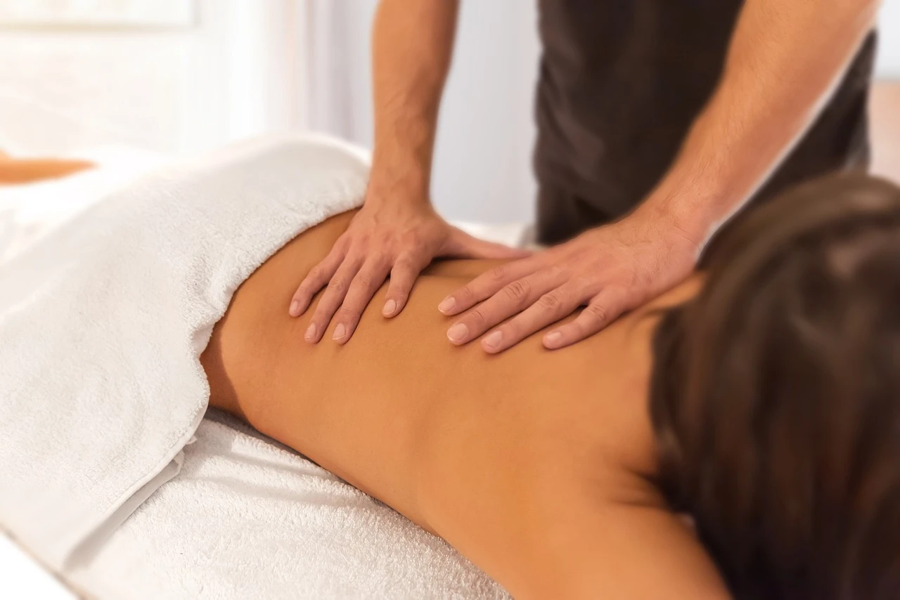 Massage therapy session with relaxing atmosphere