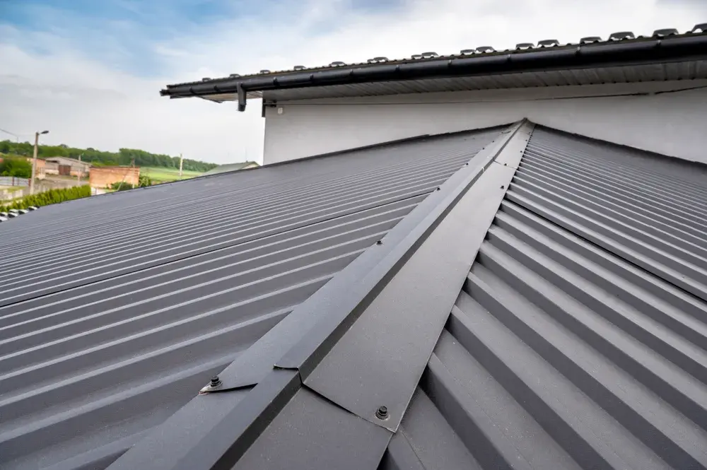 Metal roof installation on a sloped roof