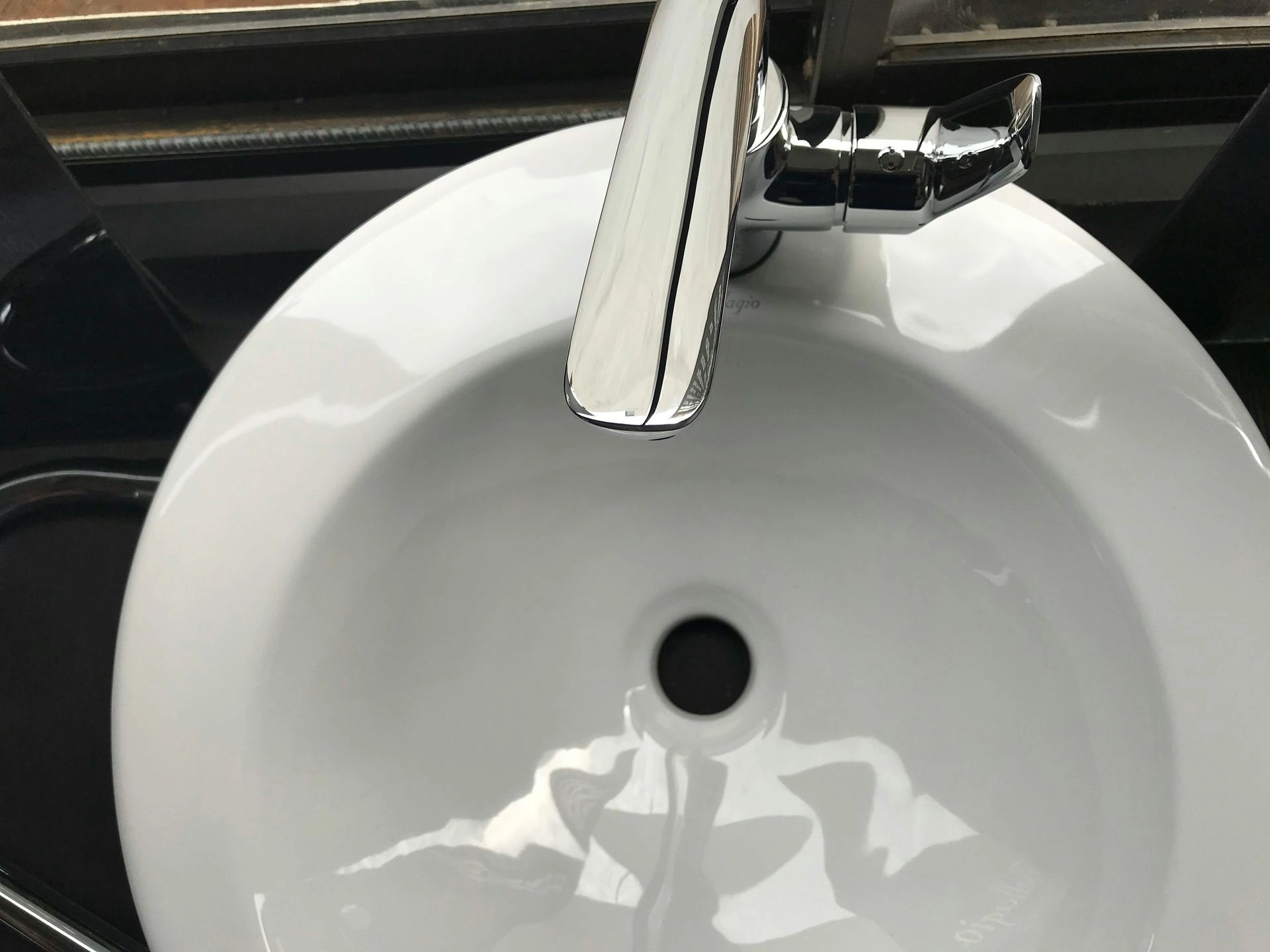 Modern bathroom sink with chrome faucet
