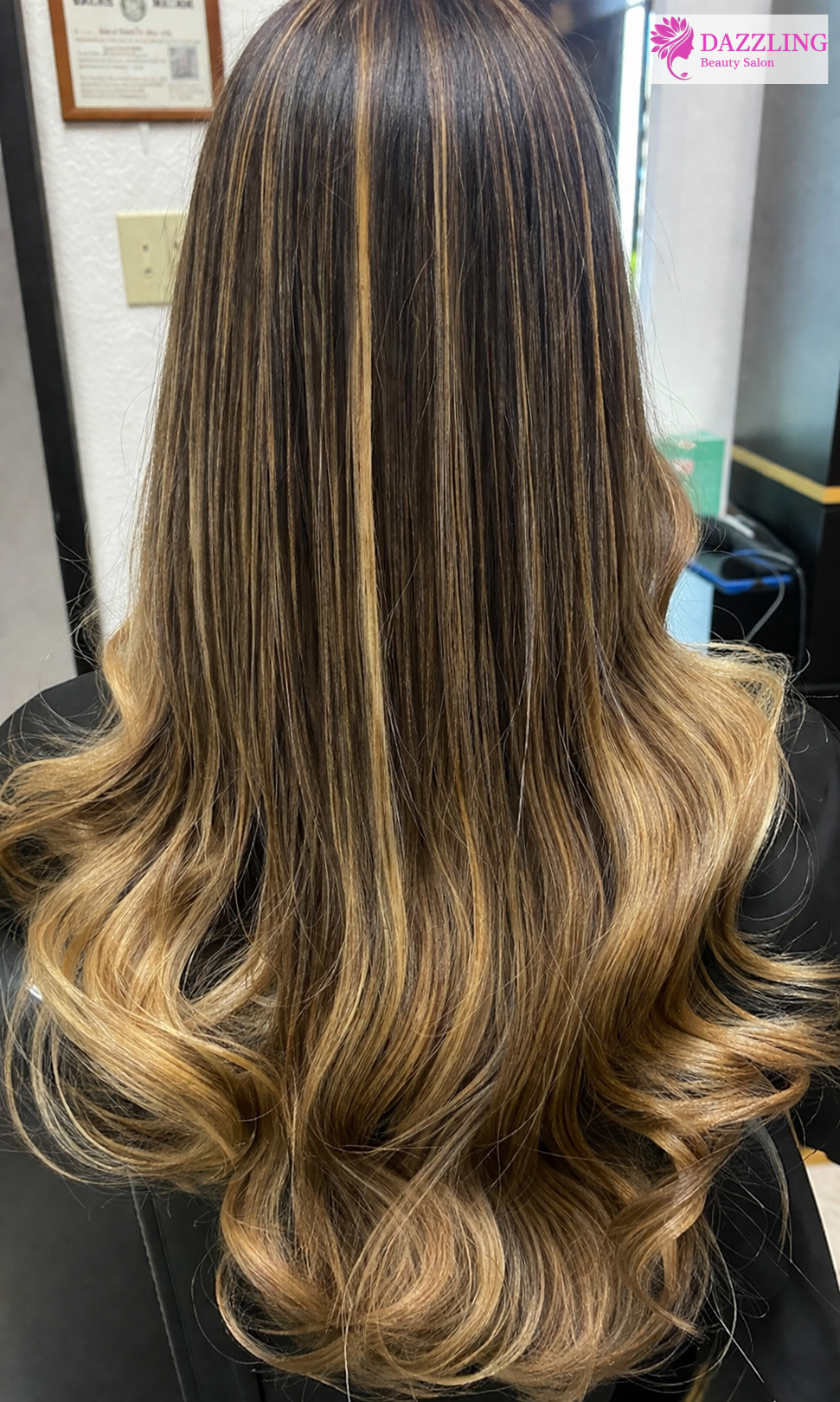Long wavy hair with highlights styled beautifully