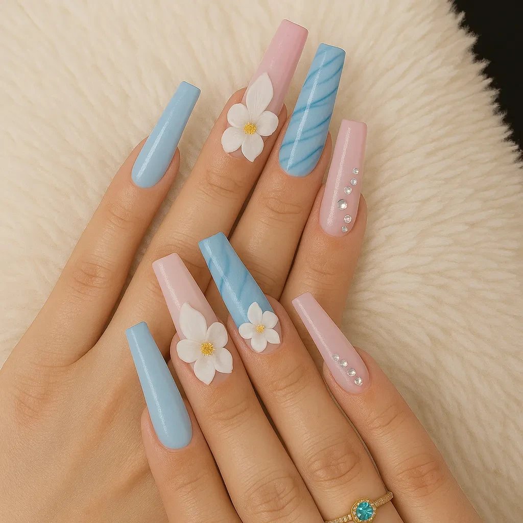 Stylish long gel nails with floral designs and pastel colors