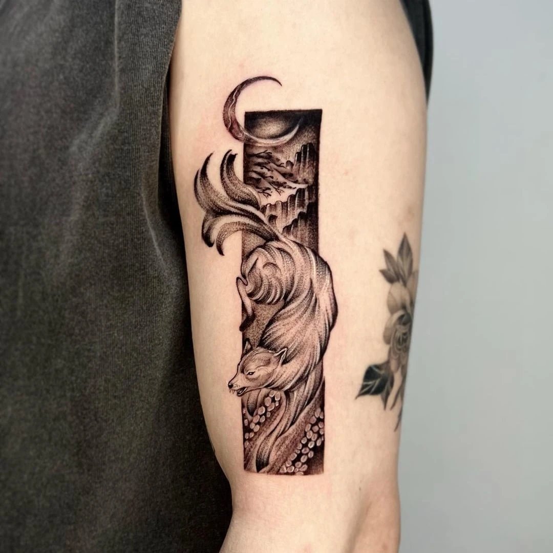Tattoo of a fox with swirling fur and a crescent moon