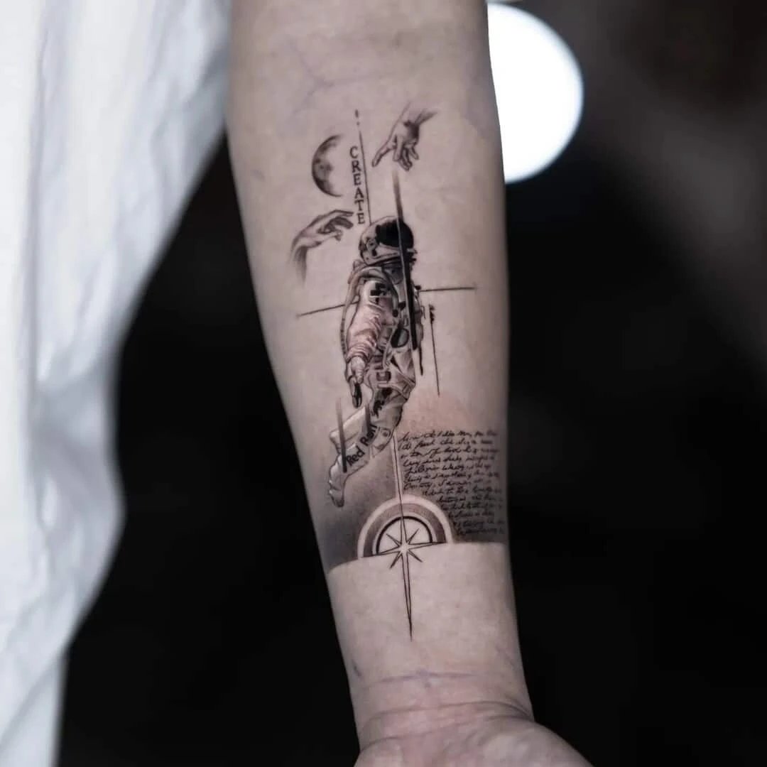 Astronaut tattoo art on forearm with celestial elements