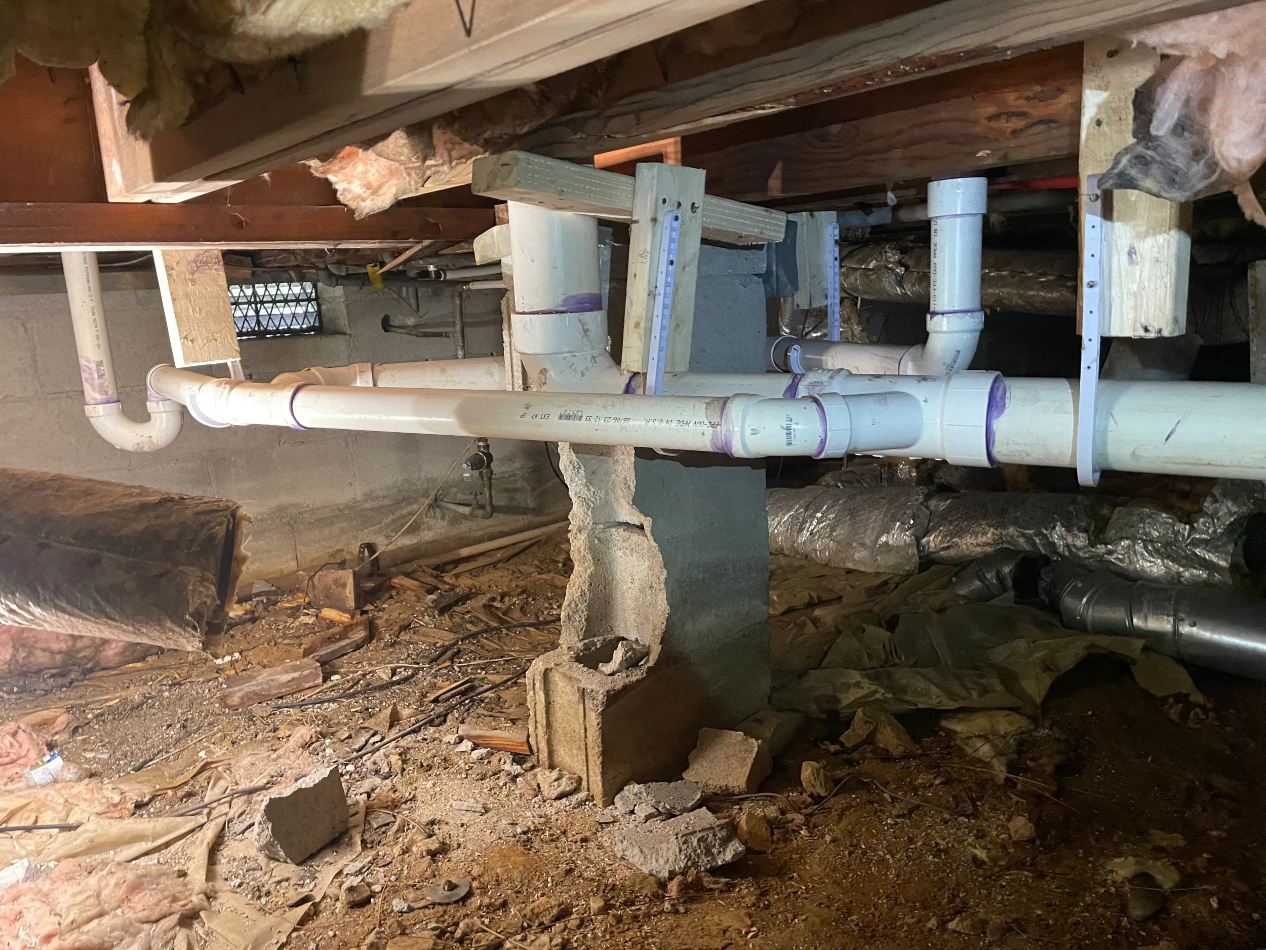 PVC plumbing system in a basement