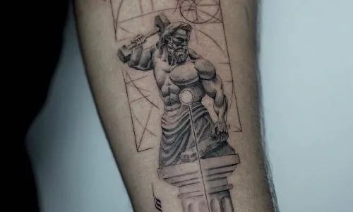 Tattoo of a muscular figure holding a hammer