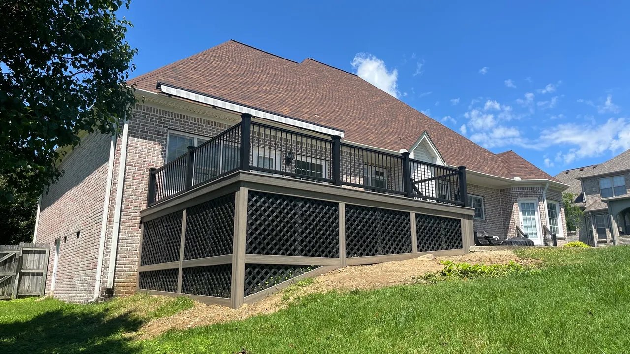Beautiful house exterior with deck and blue sky