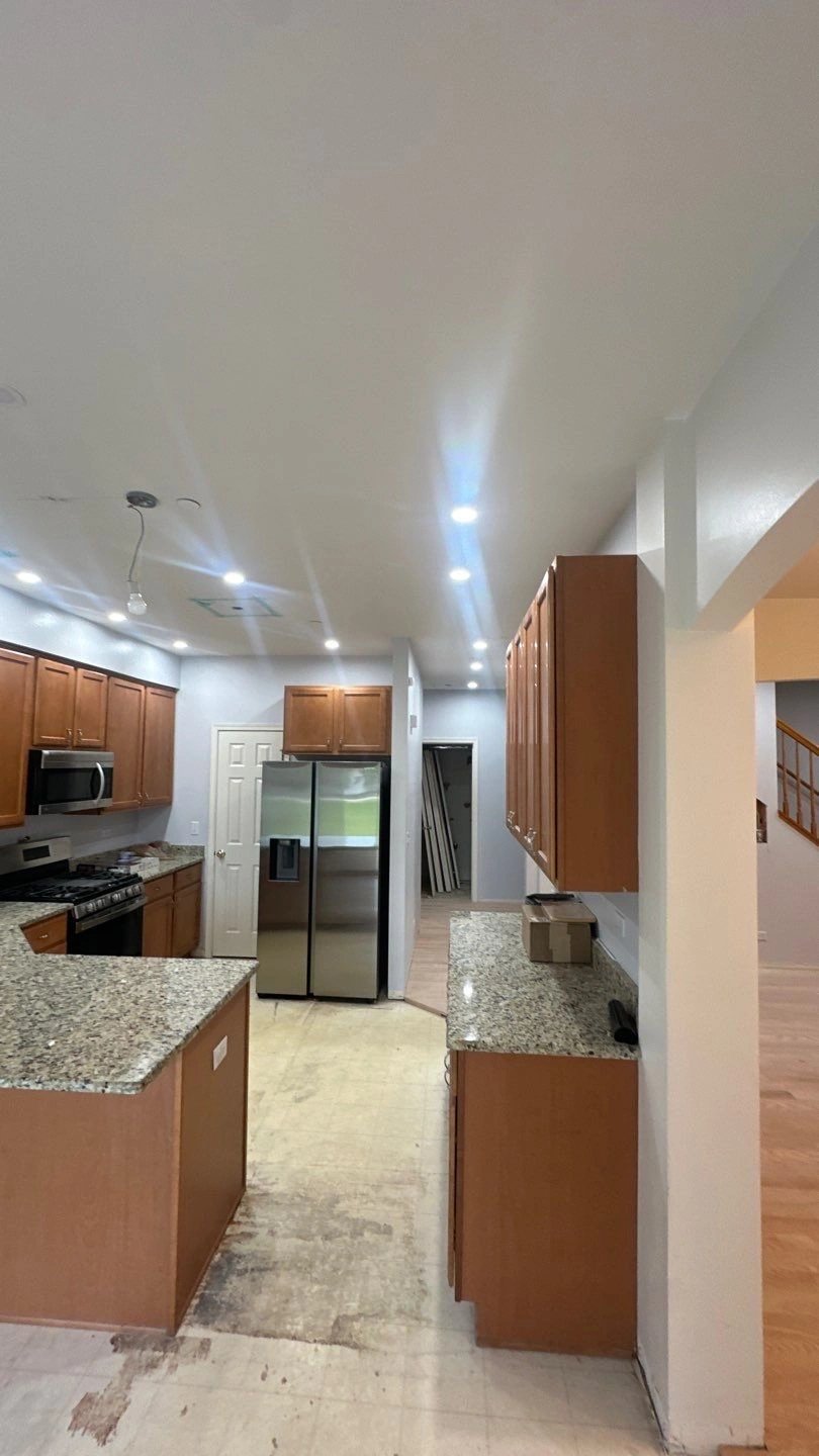 Modern kitchen with wooden cabinets and granite countertops