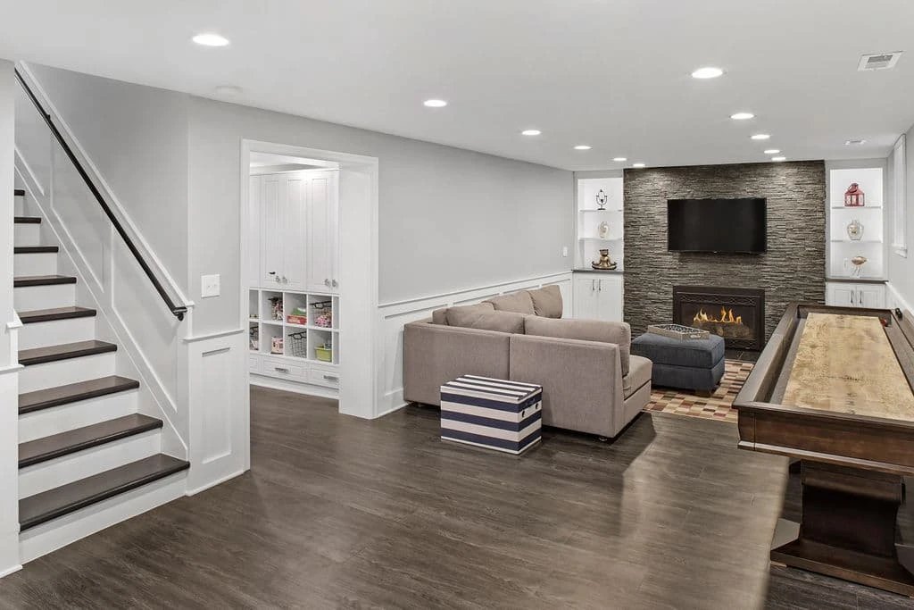 Modern living room with fireplace and stairs