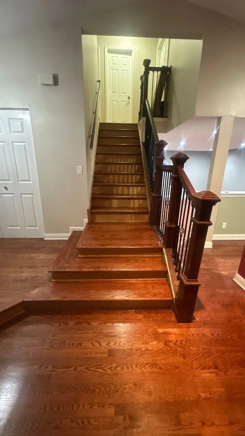 Elegant wooden staircase with railings