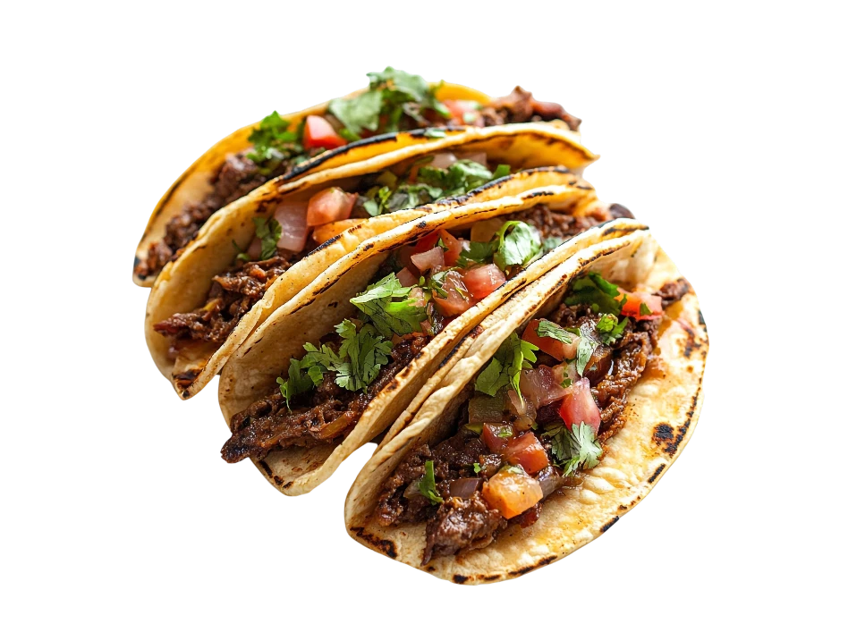 Delicious beef tacos garnished with fresh cilantro and diced tomatoes
