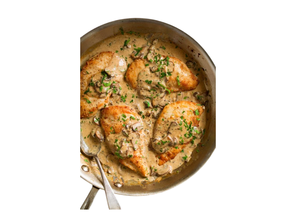 Chicken in creamy mushroom sauce garnished with herbs