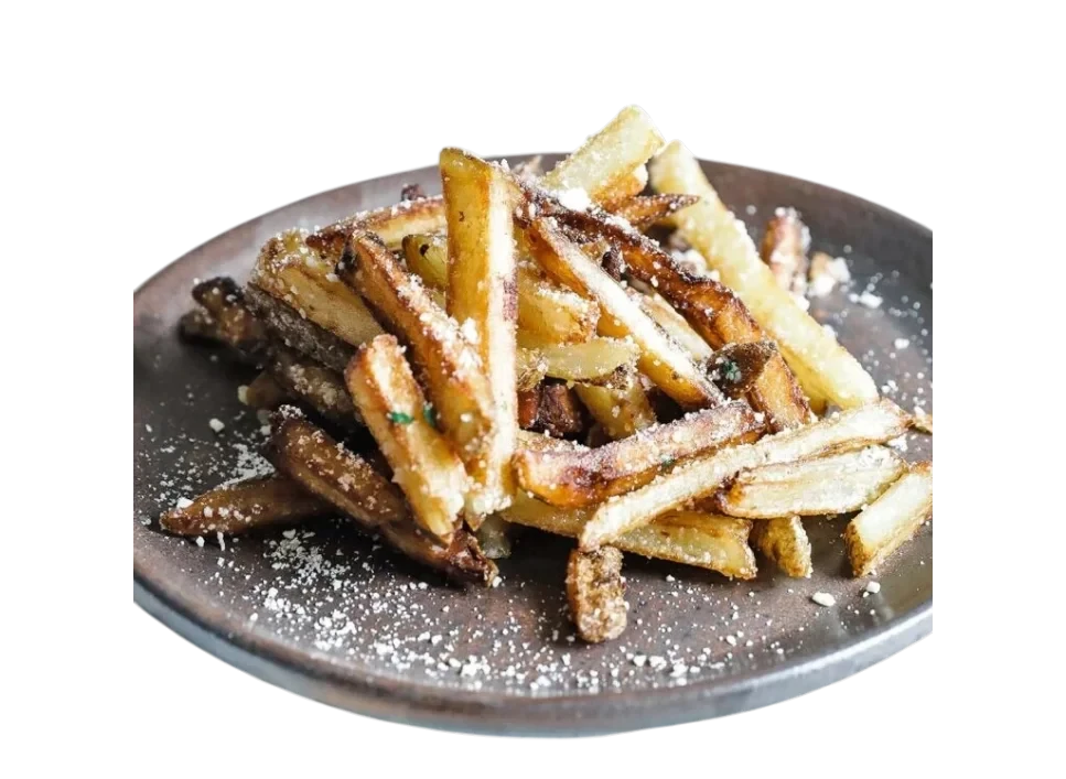 Plate of golden-brown fries topped with seasoning