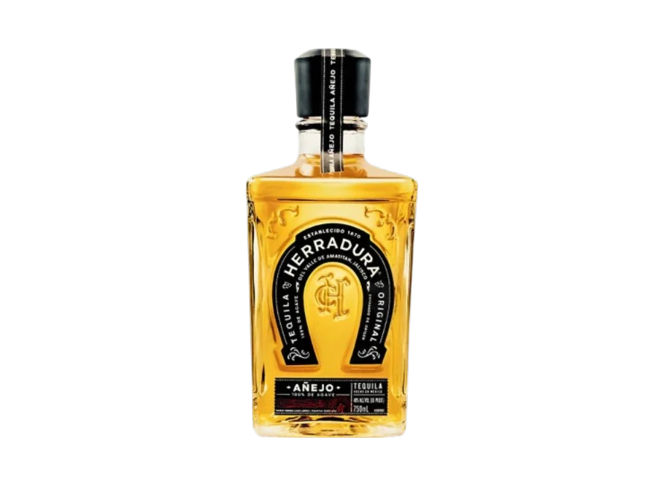 Bottle of Herradura Añejo Tequila on a black background