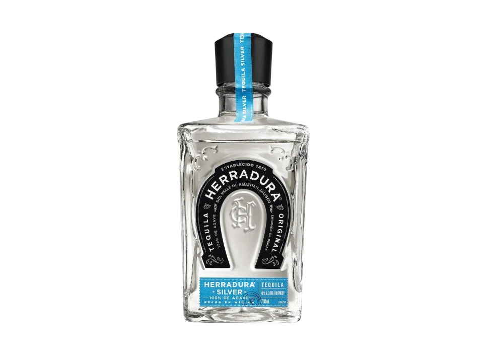 Bottle of Herradura Silver Tequila against a black background