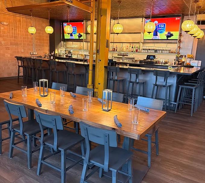 Interior view of a restaurant bar and dining area