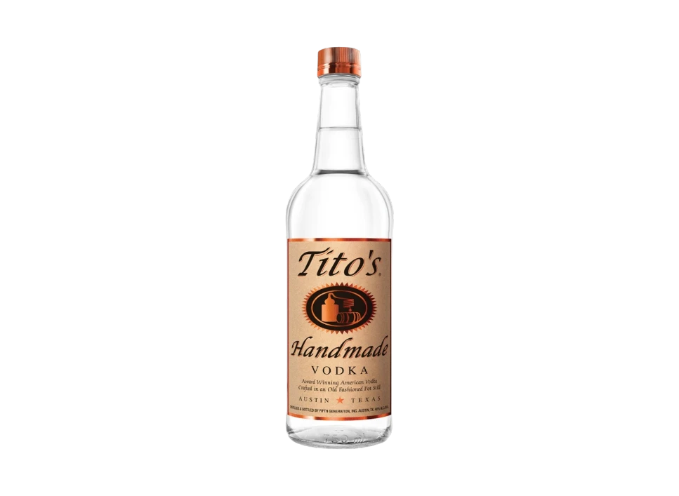 Tito's Handmade Vodka bottle against a black background