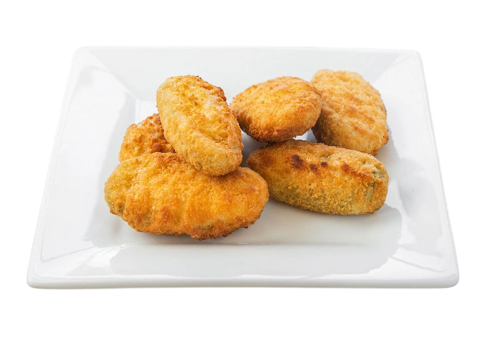 Plate of assorted breaded chicken nuggets