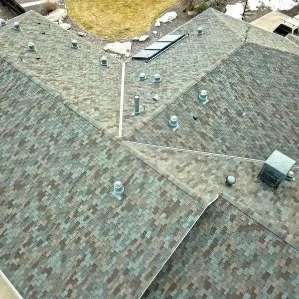 Aerial view of multi-colored asphalt shingle roof.