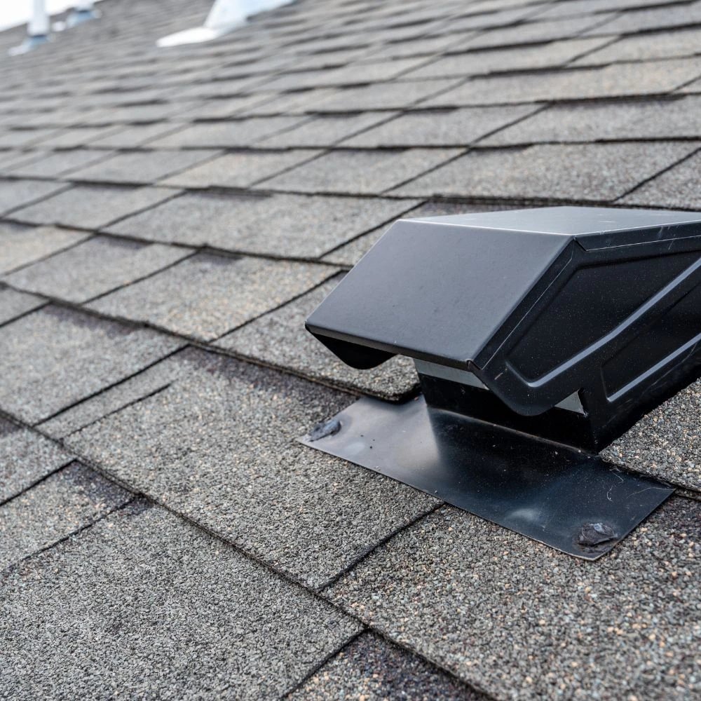 Roof vent on a shingled roof