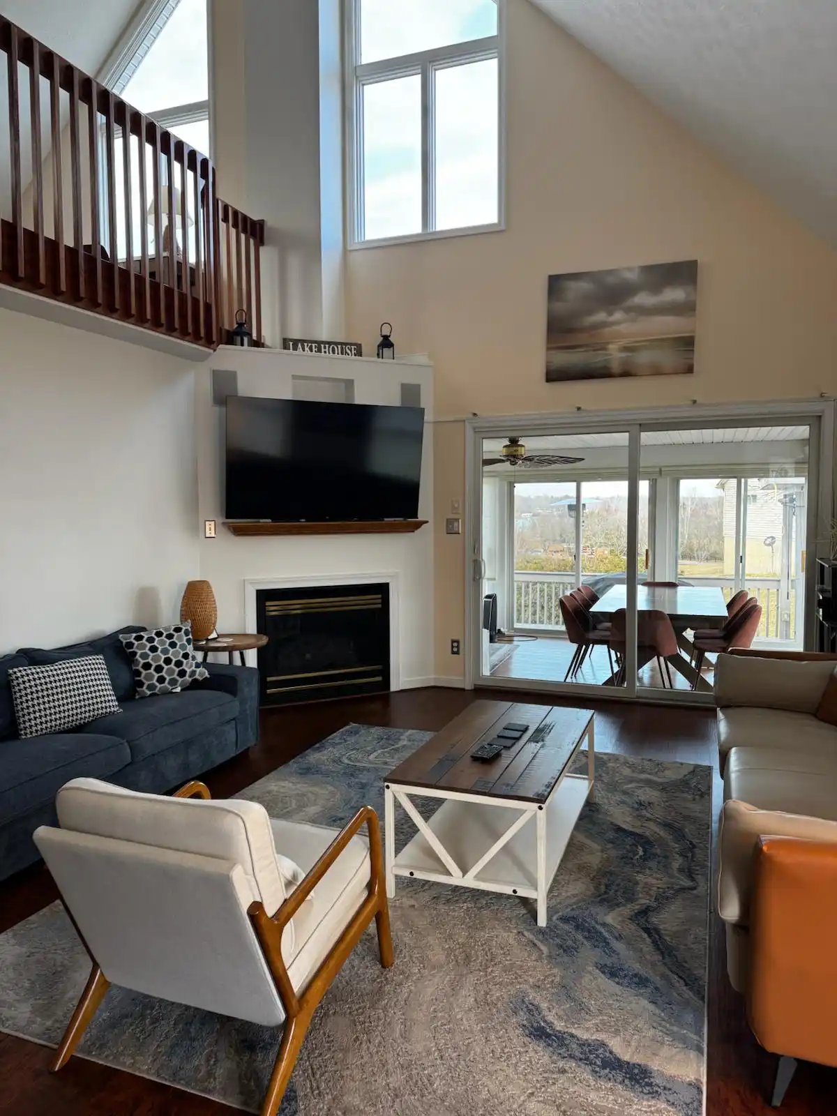 Modern living room with large windows and stylish furniture