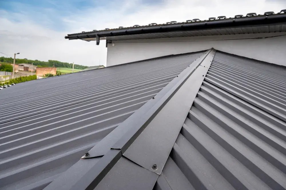 Metal roof installation on a sloped roof