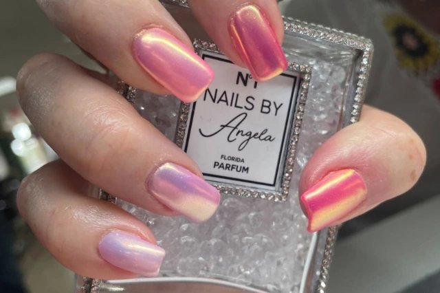 Colorful nail polish display featuring ombre design