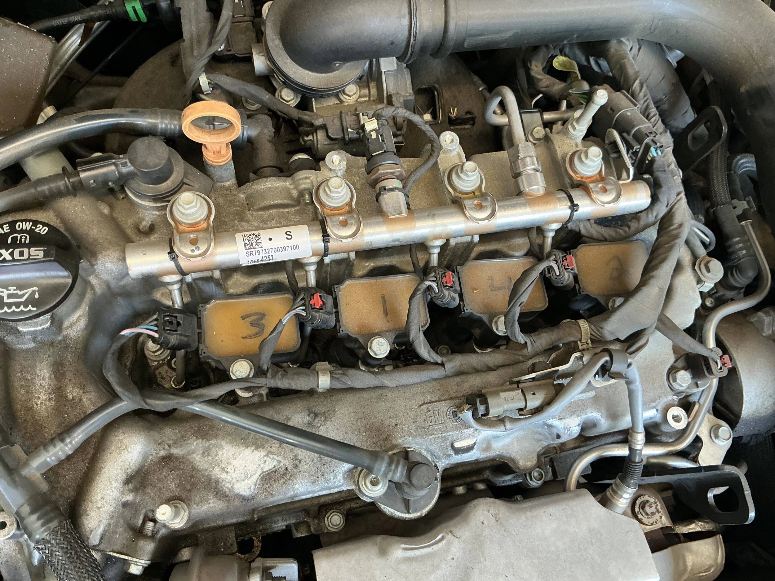 Close-up view of an engine's fuel injector system.