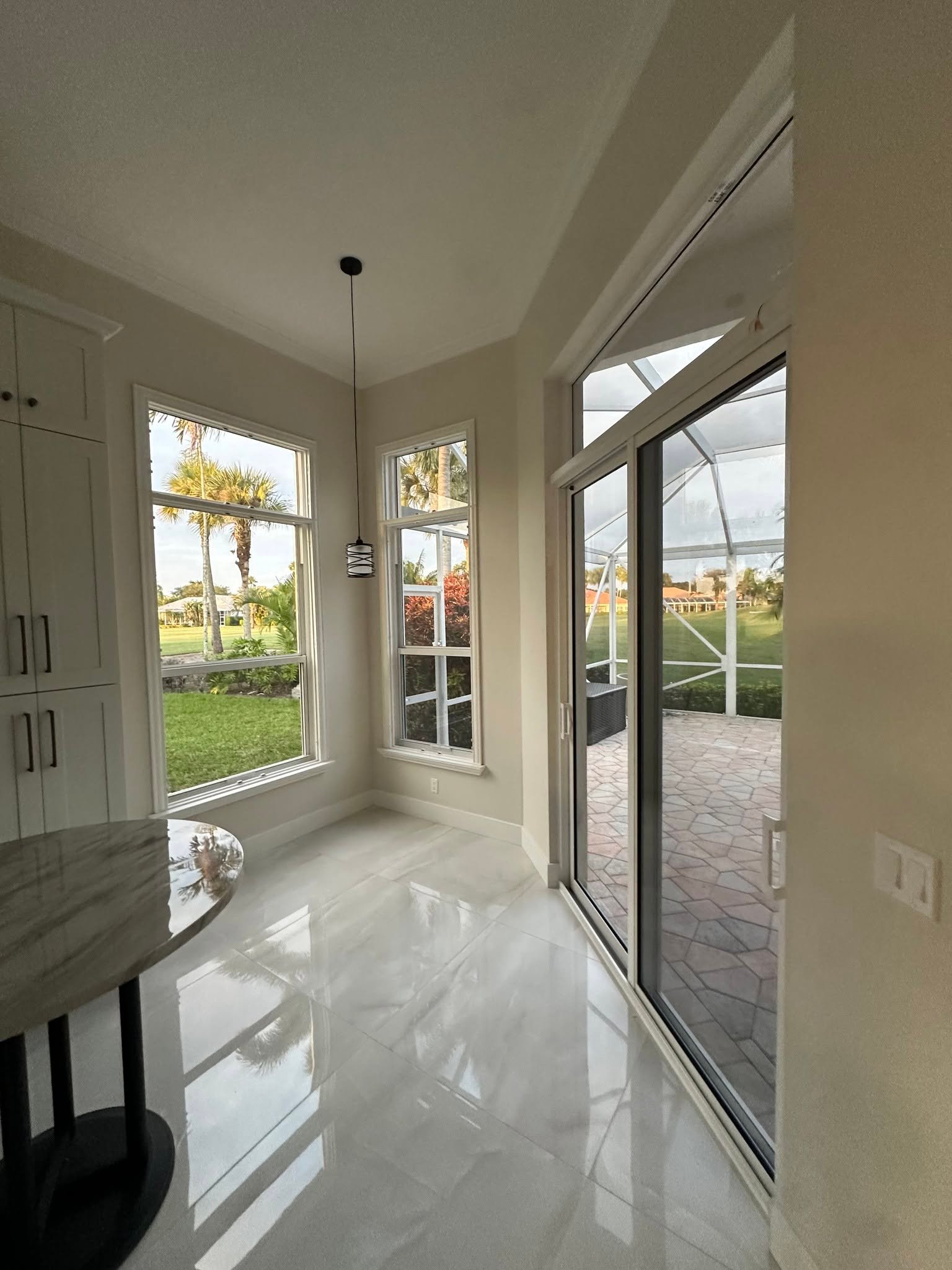Modern interior kitchen with marble and glass door
