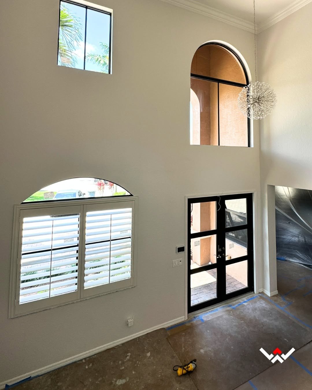 Spacious entryway of a modern home with arches