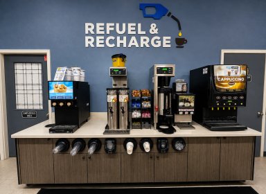Self-service beverage station with coffee and snacks