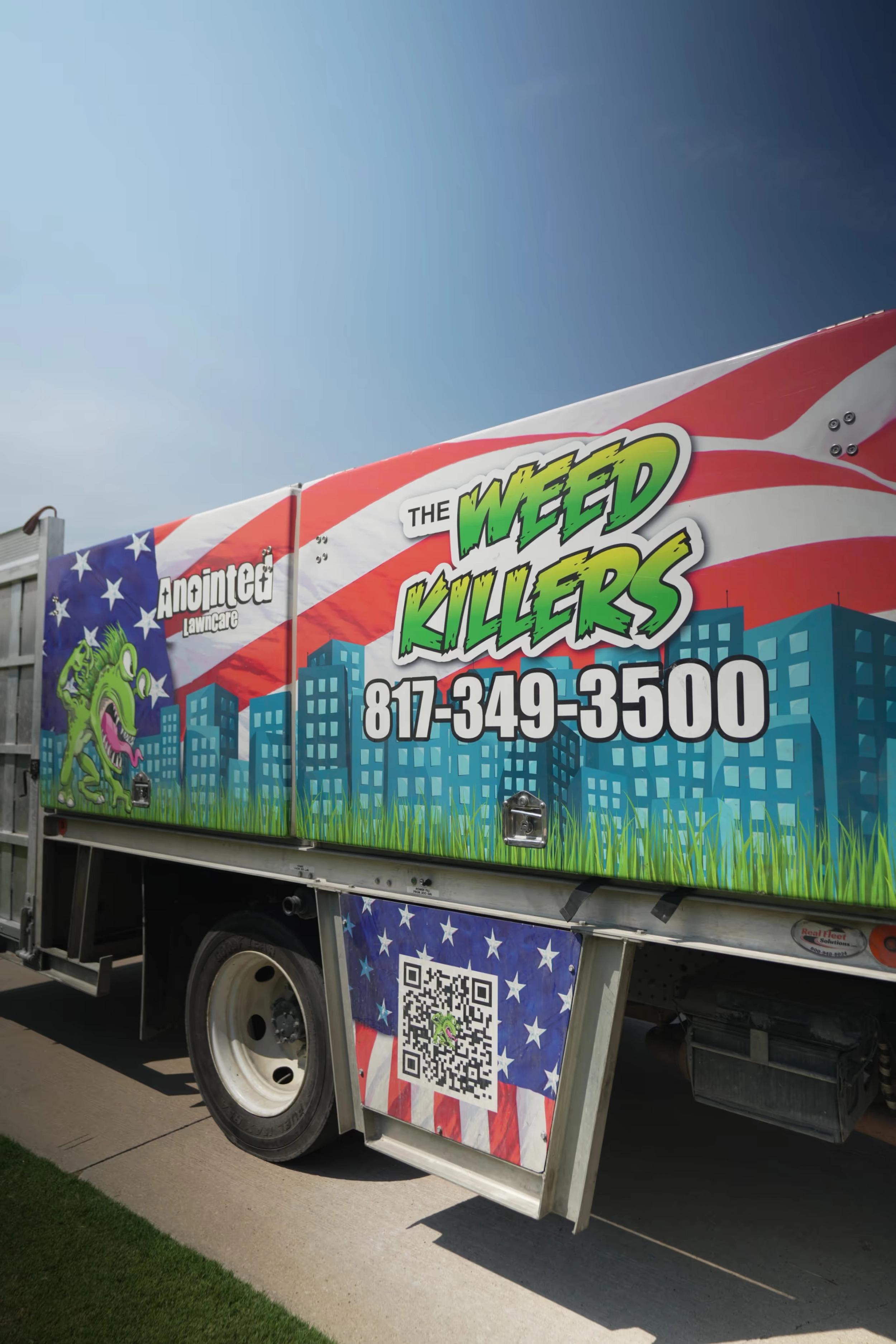 A vibrant truck advertisement for a lawn care service.