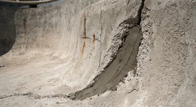 Close-up of concrete with fresh cement mix in a curved structure