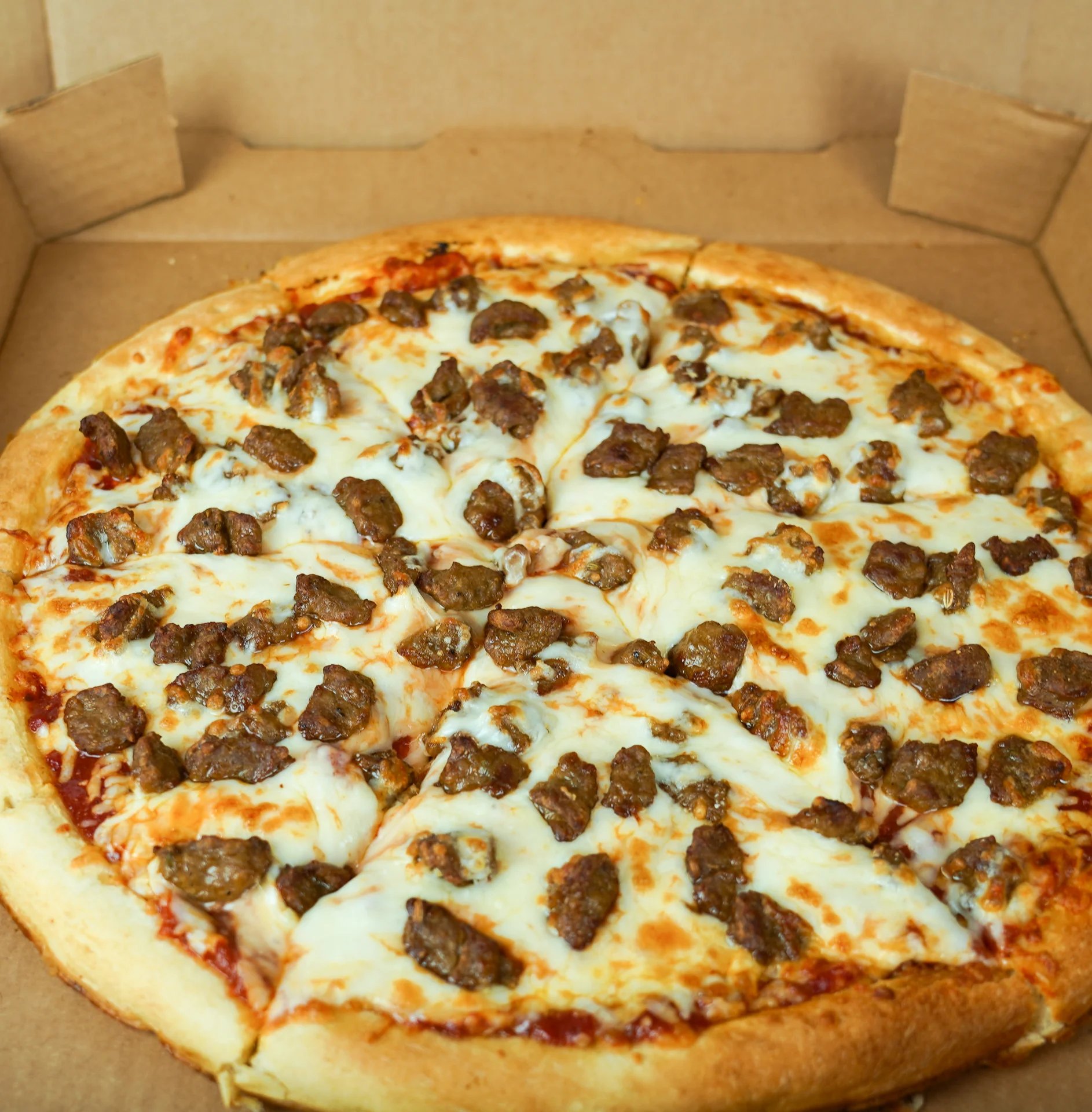 Delicious meatlover's pizza in a box