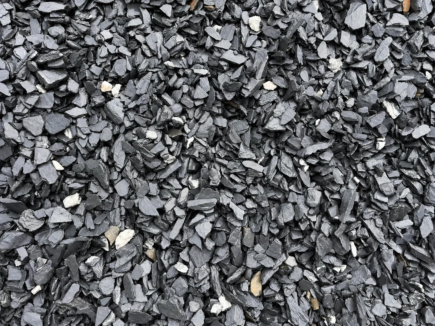 Close-up of black slate gravel texture