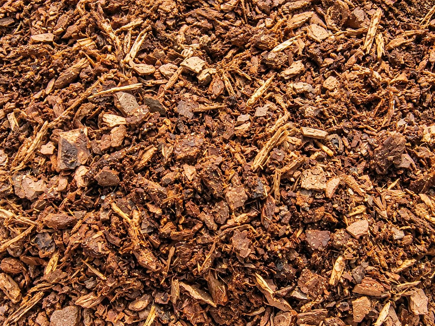 Close-up of textured mulch material in earthy tones