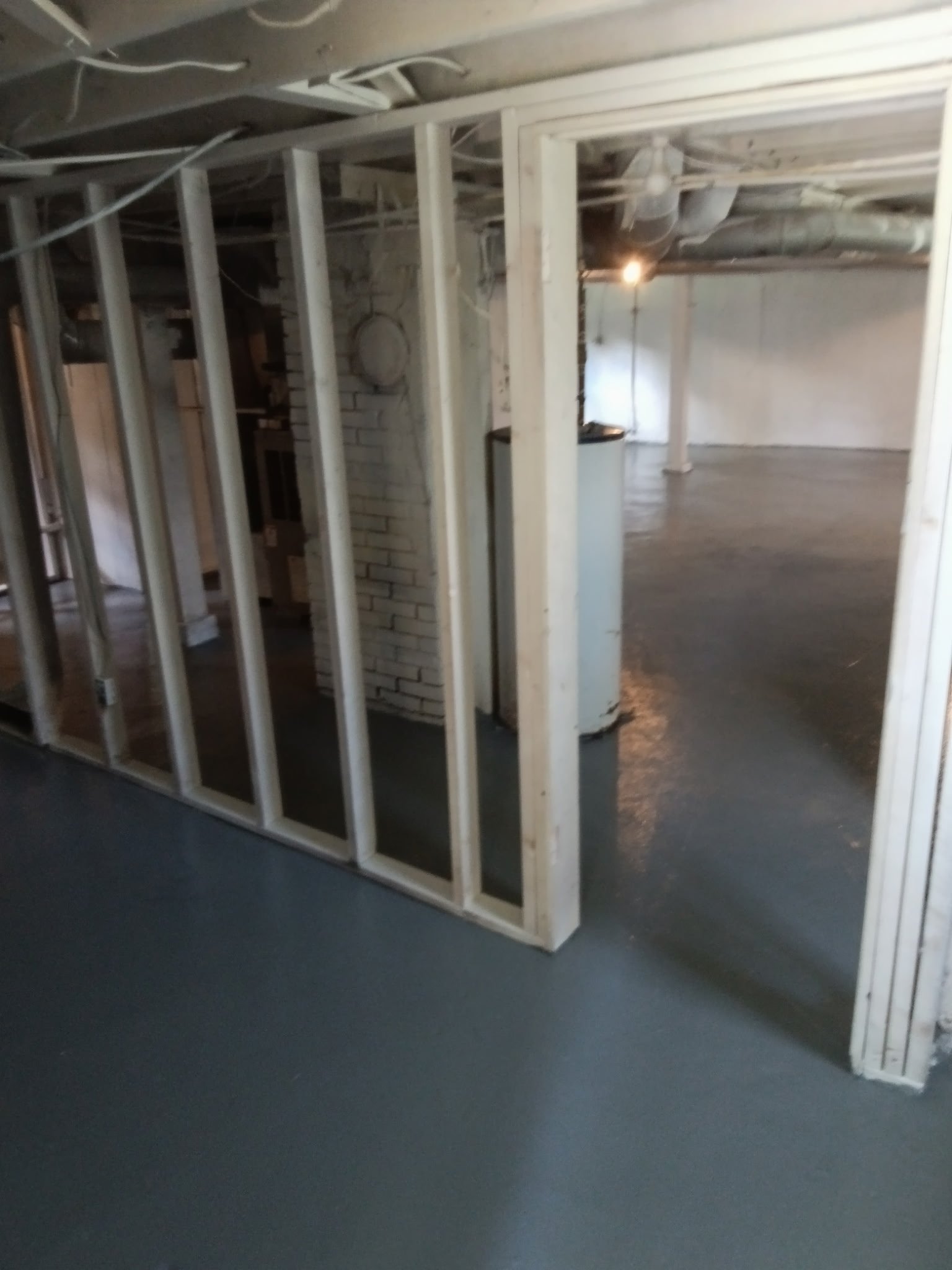 Interior view of an unfinished basement renovation project